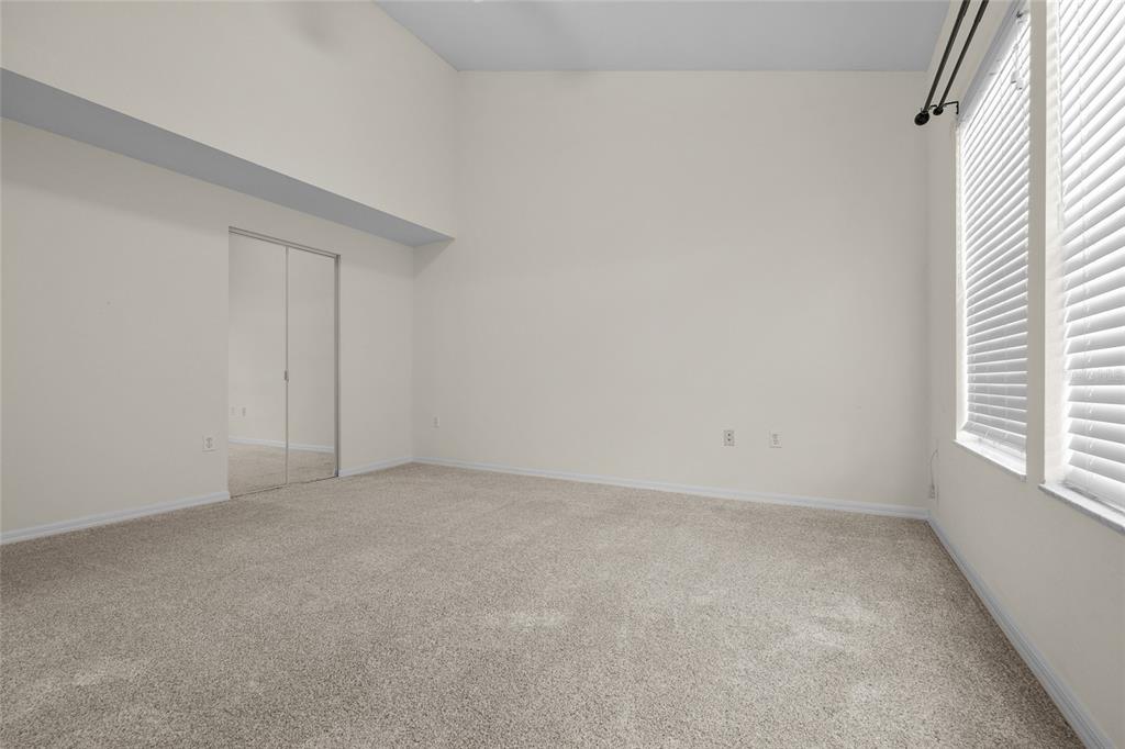 4941 Southwest 91 Terrace, Unit N301 Gainesville, FL 32608 - Photo 15 of 22 an empty room with windows