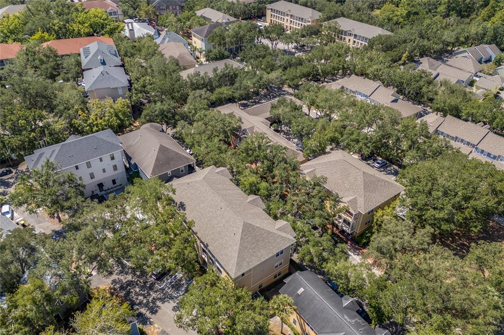 4941 Southwest 91 Terrace, Unit N301 Gainesville, FL 32608 - Photo 18 of 22 an aerial view of a house with a yard
