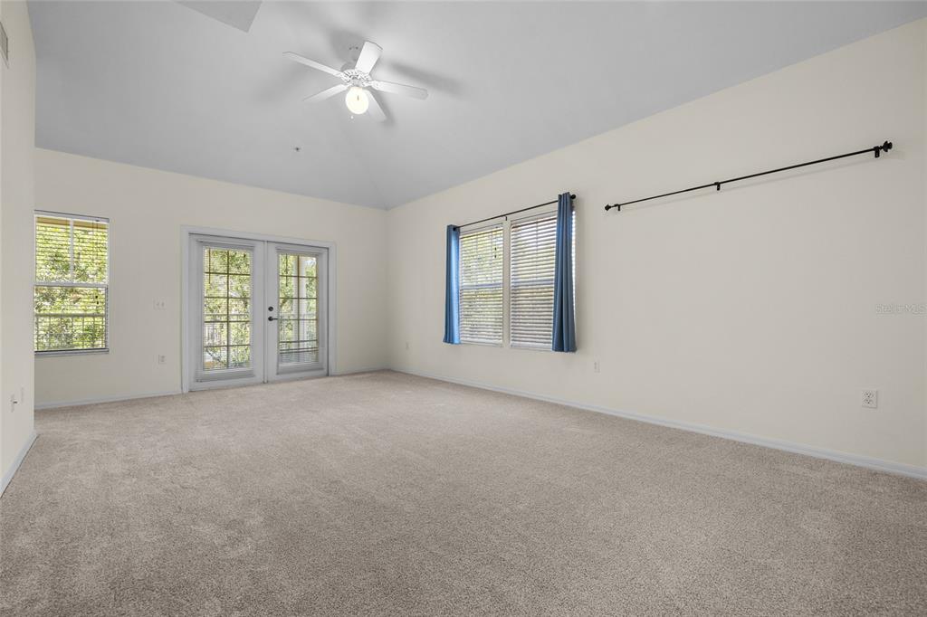 4941 Southwest 91 Terrace, Unit N301 Gainesville, FL 32608 - Photo 10 of 22 a view of an empty room with a window