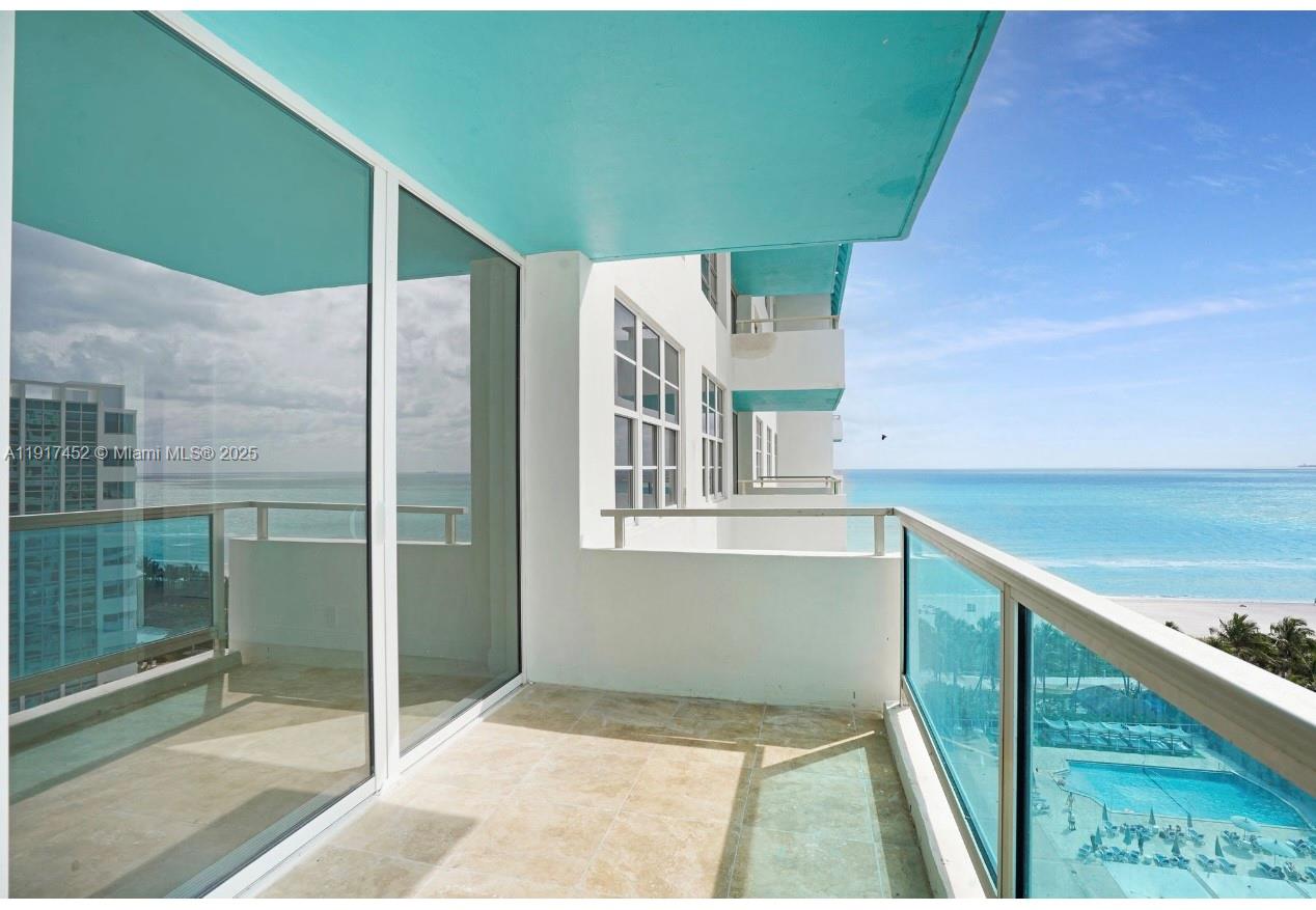 5101 Collins Avenue, Unit 14J Miami Beach, FL 33140 - Photo 1 of 10 a balcony view with a outdoor space