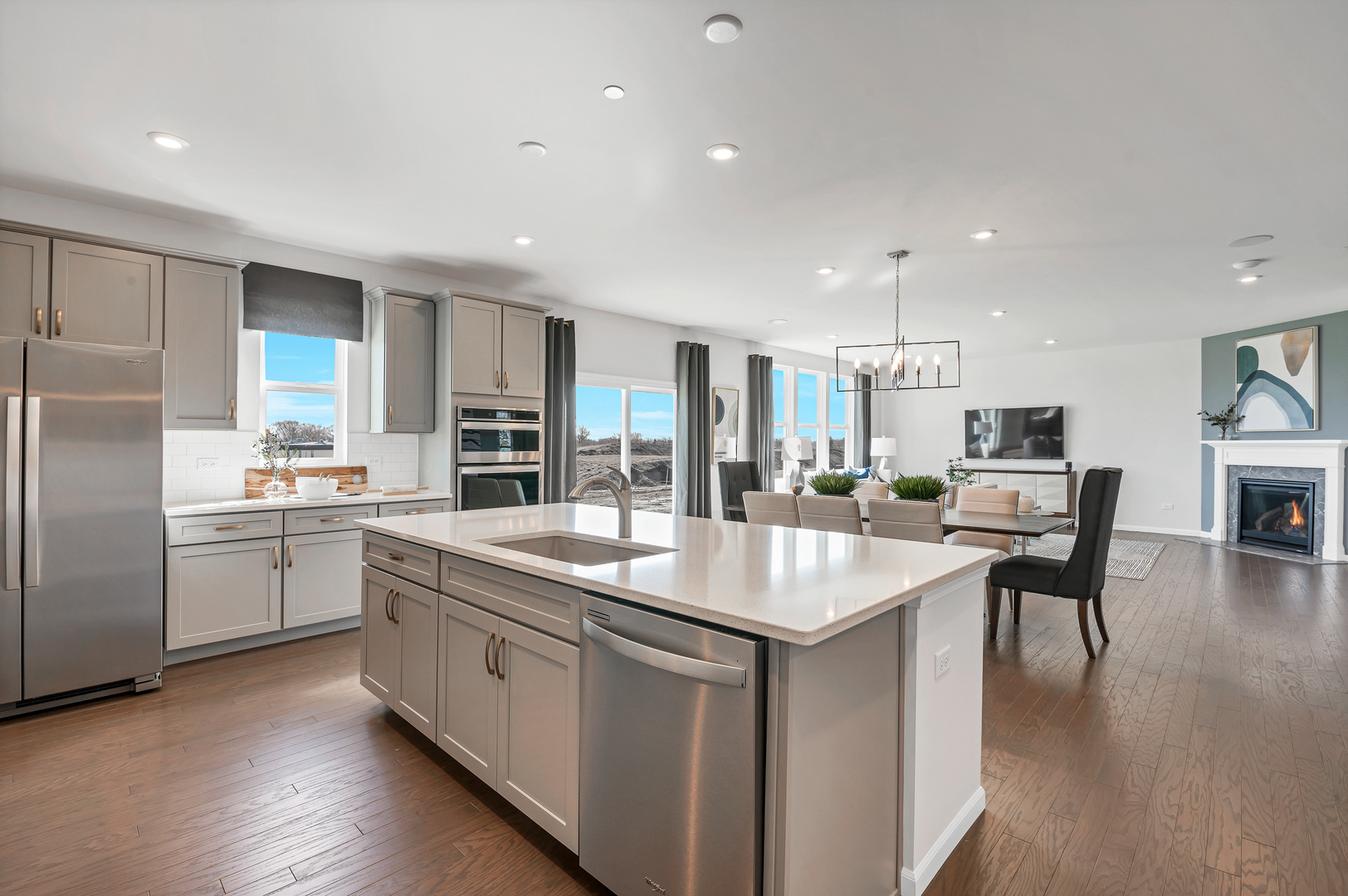 621 North Sullivan Street Addison, IL 60101 - Photo 12 of 22 a large kitchen with kitchen island a sink table and chairs