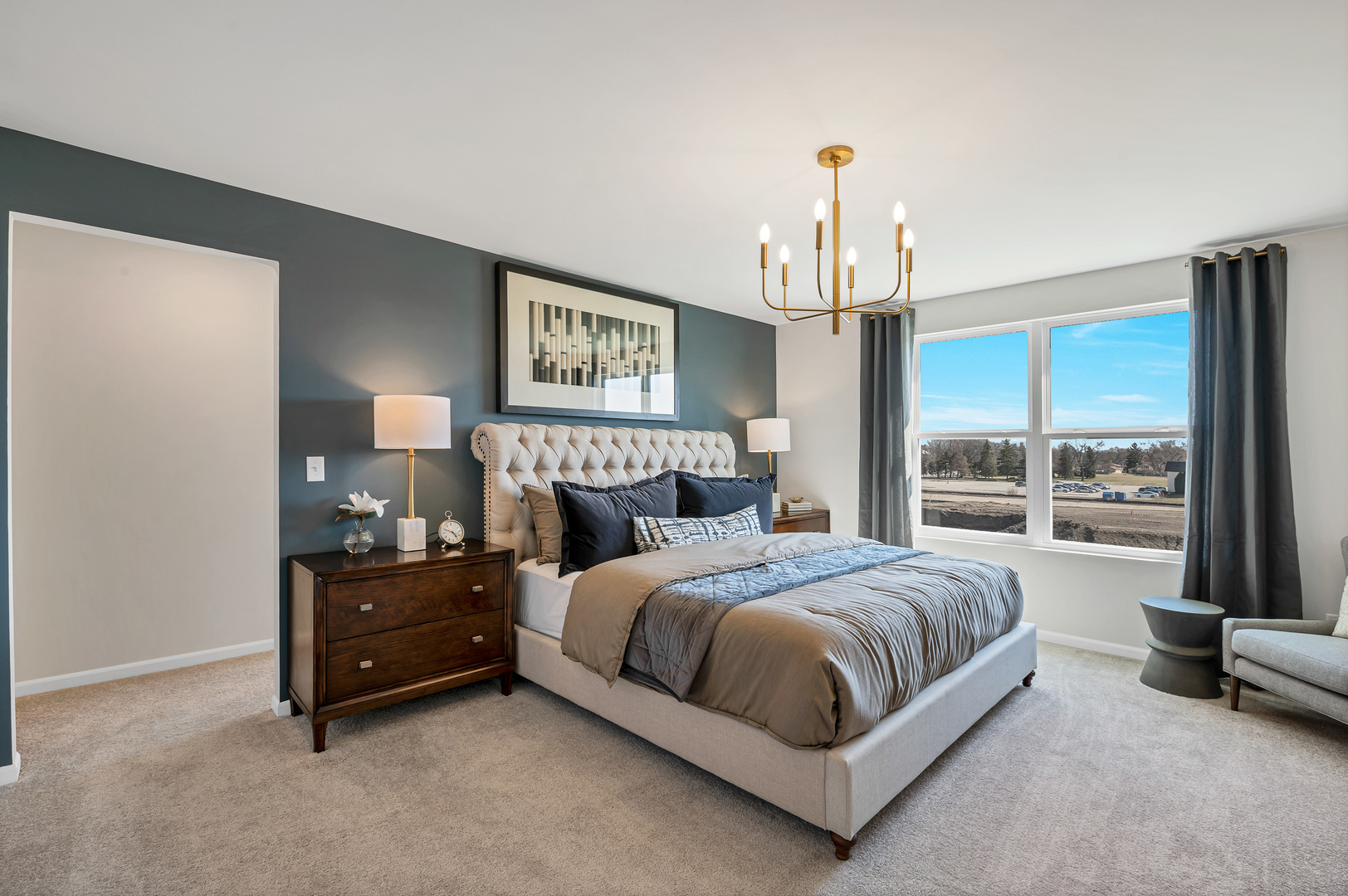 621 North Sullivan Street Addison, IL 60101 - Photo 20 of 22 a spacious bedroom with a bed and large windows