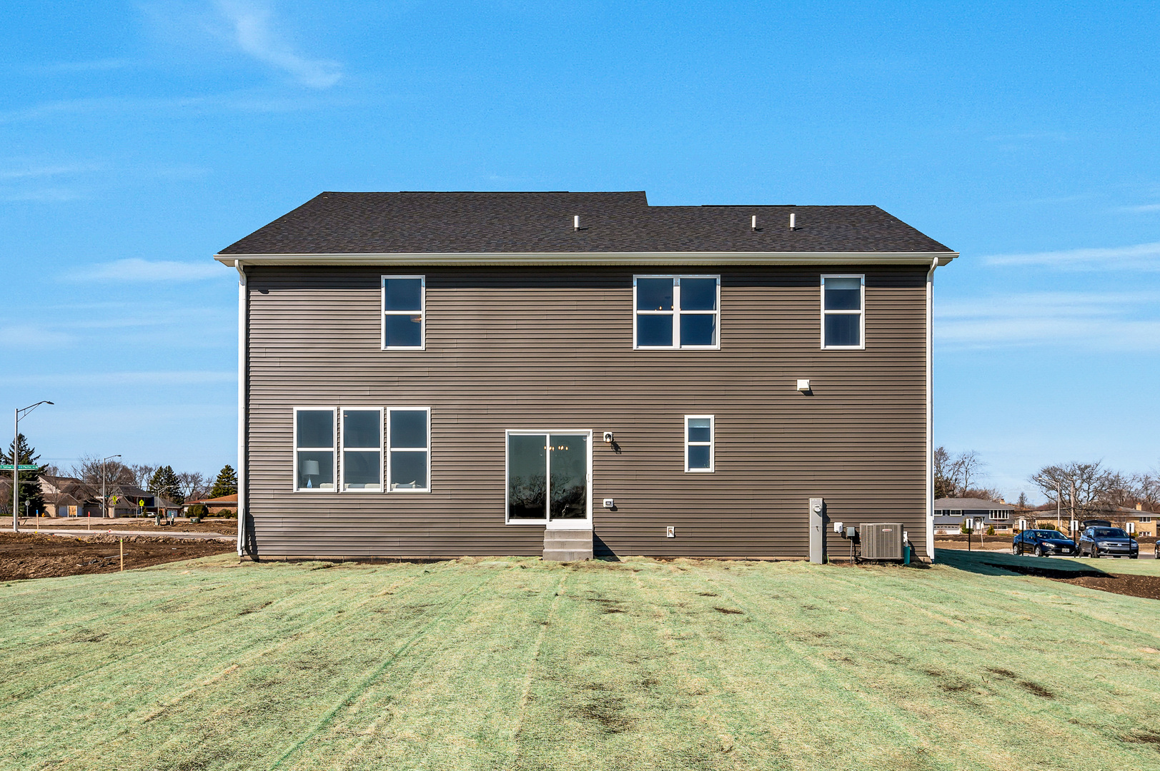 621 North Sullivan Street Addison, IL 60101 - Photo 2 of 22 a brick house with a yard