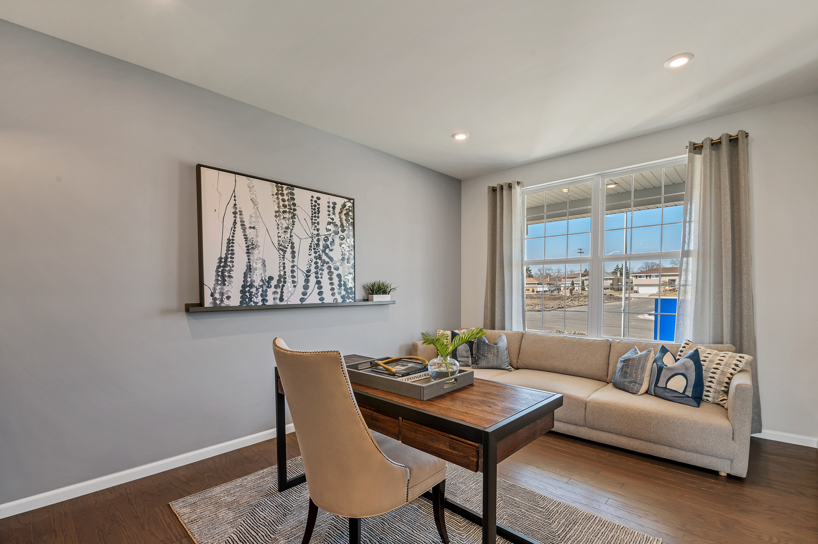 621 North Sullivan Street Addison, IL 60101 - Photo 3 of 22 a living room with furniture and a large window