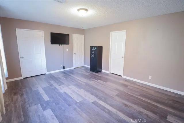 a bathroom with a shower and a sink