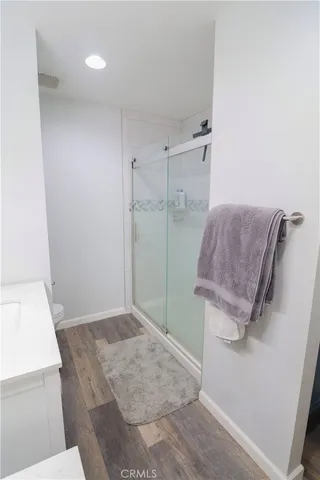 a building outdoor space with patio furniture and potted plants