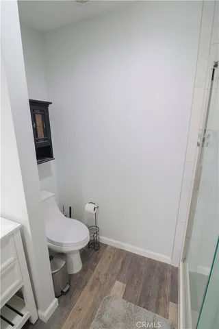 a view of a patio with a table and chairs