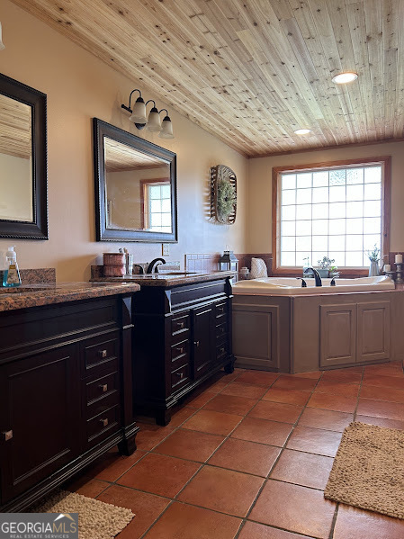 2838 Skitts Mountain Road Cleveland, GA 30528 - Photo 13 of 41 a kitchen with a sink window and cabinets