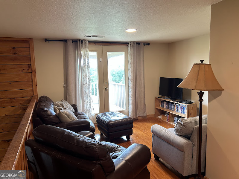 2838 Skitts Mountain Road Cleveland, GA 30528 - Photo 19 of 41 a living room with furniture and a window