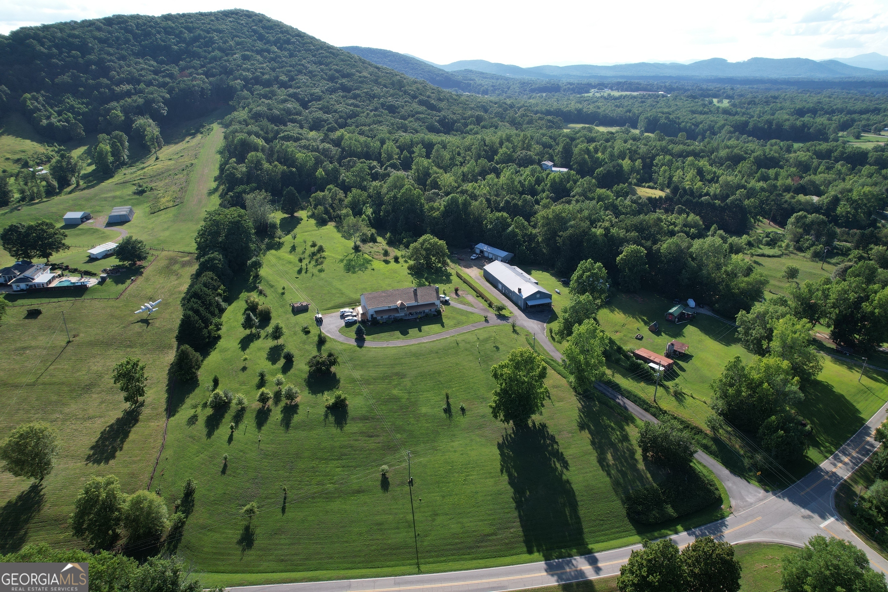 2838 Skitts Mountain Road Cleveland, GA 30528 - Photo 39 of 41 an aerial view of a house with a yard