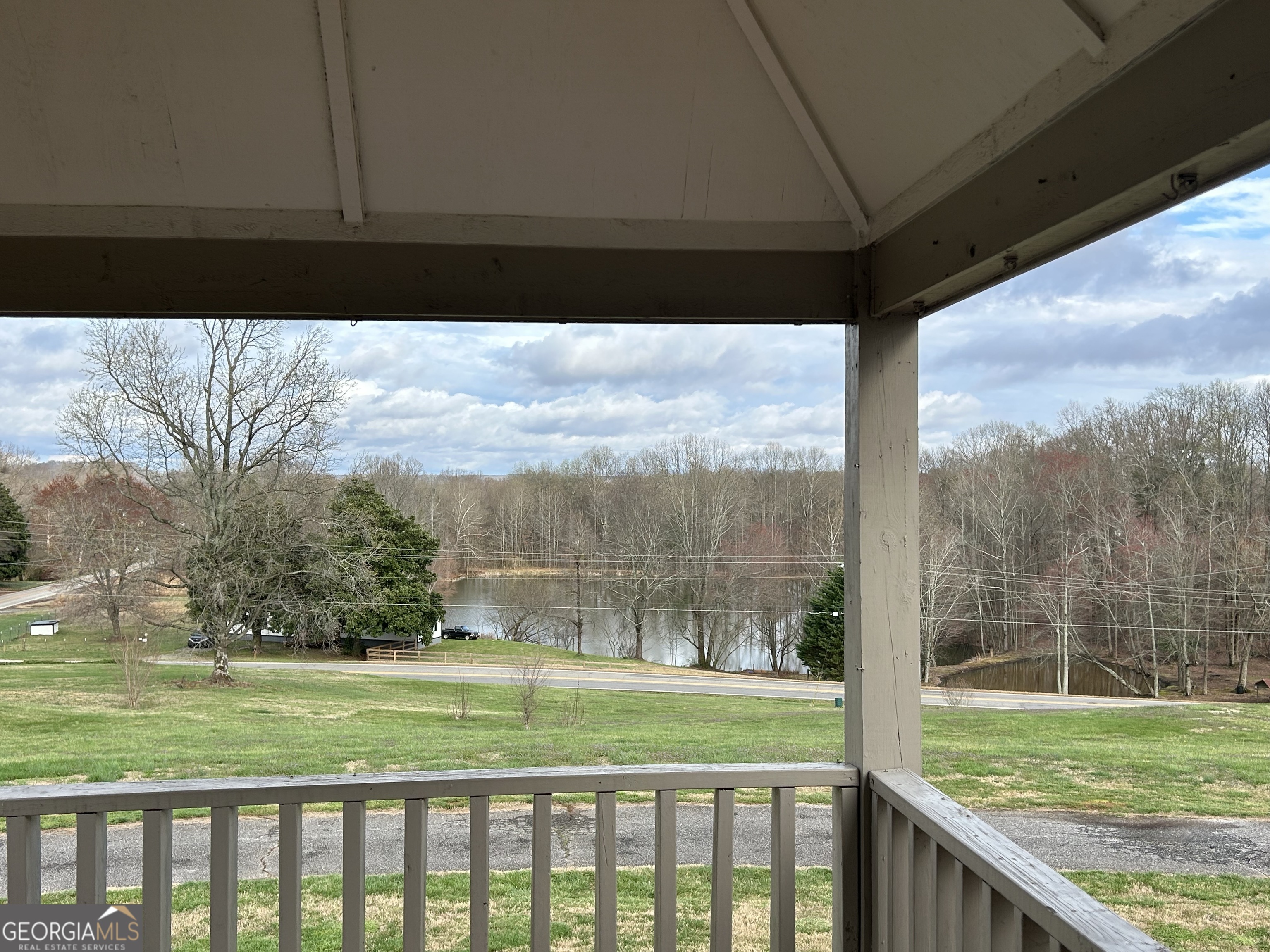 2838 Skitts Mountain Road Cleveland, GA 30528 - Photo 40 of 41 a view of a room with a large window and wooden fence