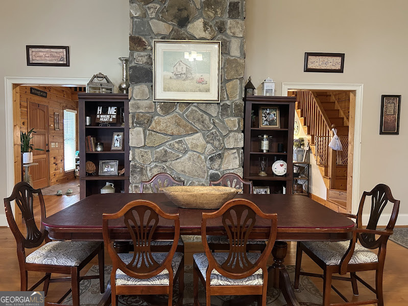 2838 Skitts Mountain Road Cleveland, GA 30528 - Photo 9 of 41 a dining room with furniture and wooden floor