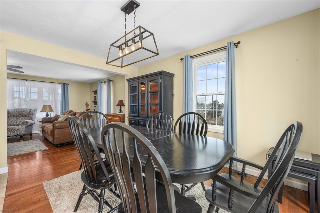 138 Sprague Street Fall River, MA 02724 - Photo 12 of 34 a view of a dining room with furniture window and wooden floor