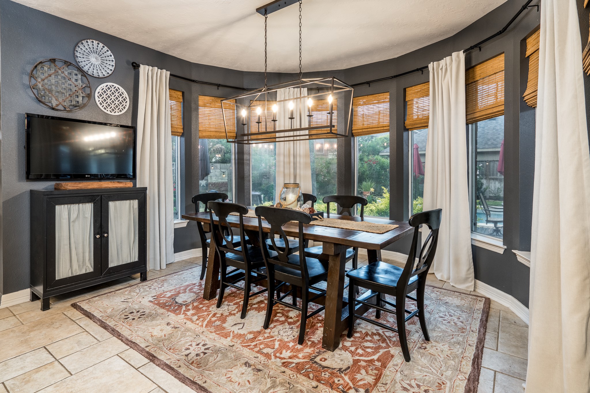 10411 Harnwell Crossing Drive Spring, TX 77379 - Photo 16 of 50 a view of a dining room with furniture window and outside view