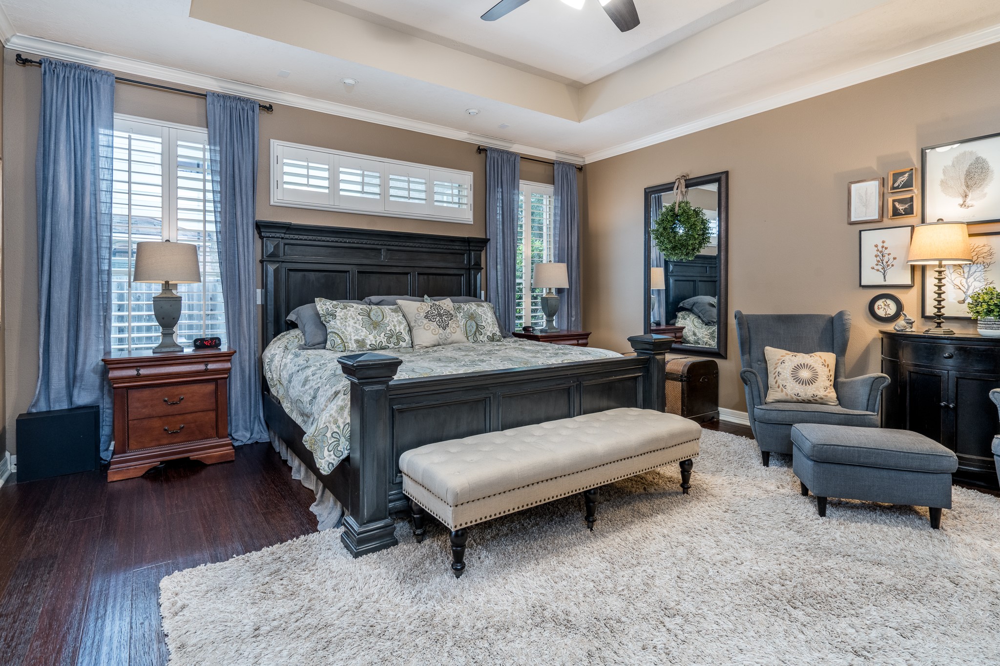 10411 Harnwell Crossing Drive Spring, TX 77379 - Photo 19 of 50 a bedroom with a bed and windows