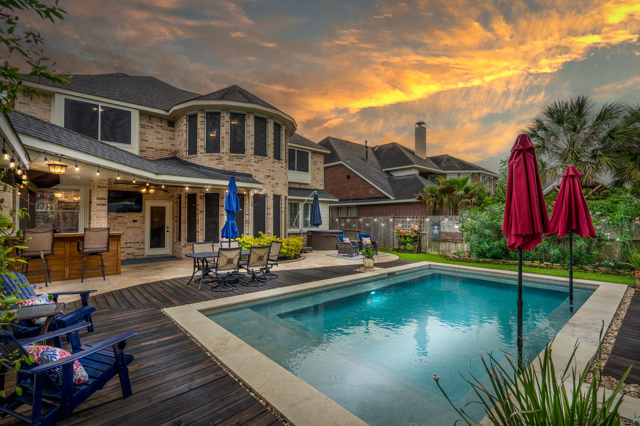 10411 Harnwell Crossing Drive Spring, TX 77379 - Photo 2 of 50 a view of a house with pool and sitting area