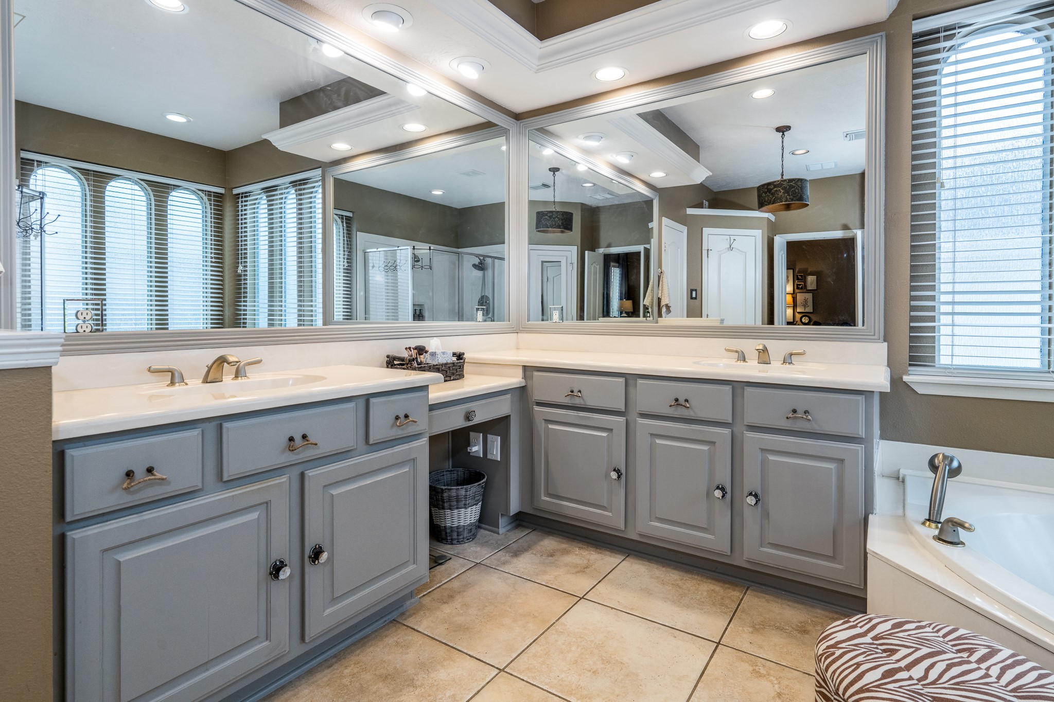 10411 Harnwell Crossing Drive Spring, TX 77379 - Photo 23 of 50 a spacious bathroom with a double vanity sink mirror and