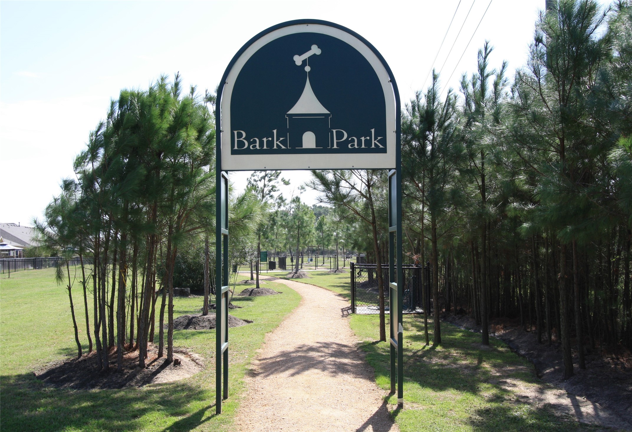 10411 Harnwell Crossing Drive Spring, TX 77379 - Photo 48 of 50 a view of a park shower and a bench