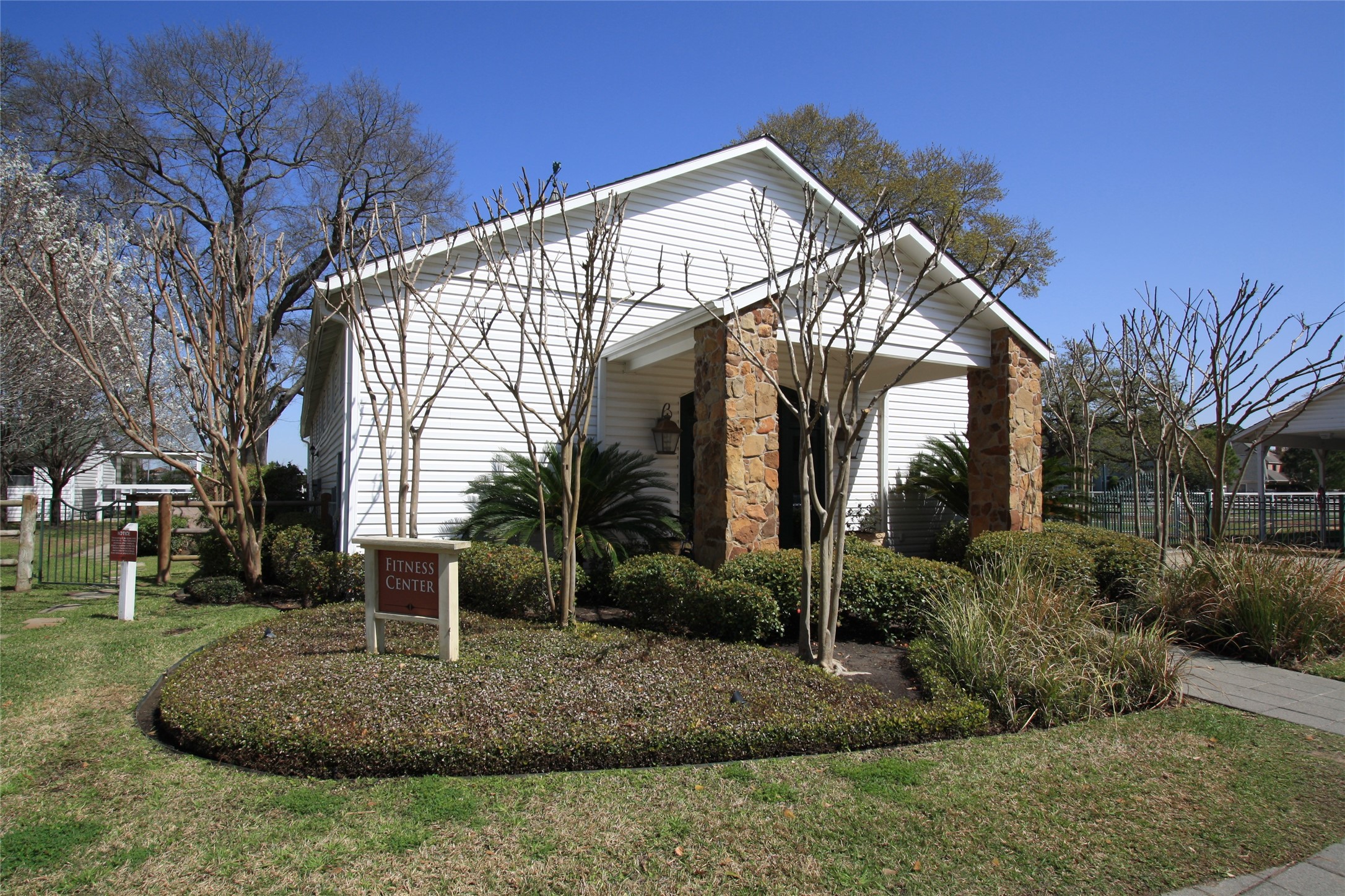 10411 Harnwell Crossing Drive Spring, TX 77379 - Photo 49 of 50 a front view of a house with garden
