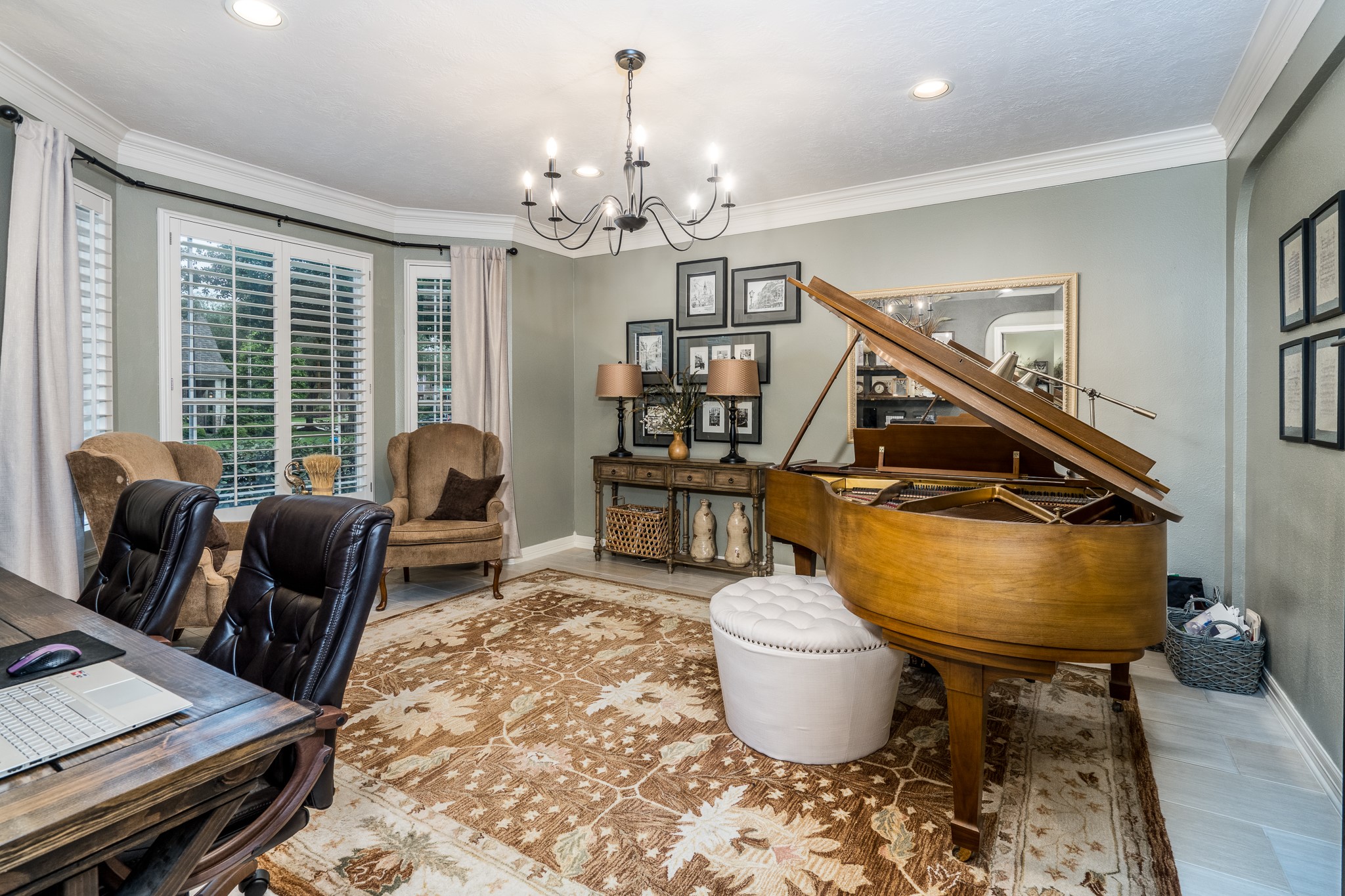 10411 Harnwell Crossing Drive Spring, TX 77379 - Photo 6 of 50 a living room with furniture and a chandelier
