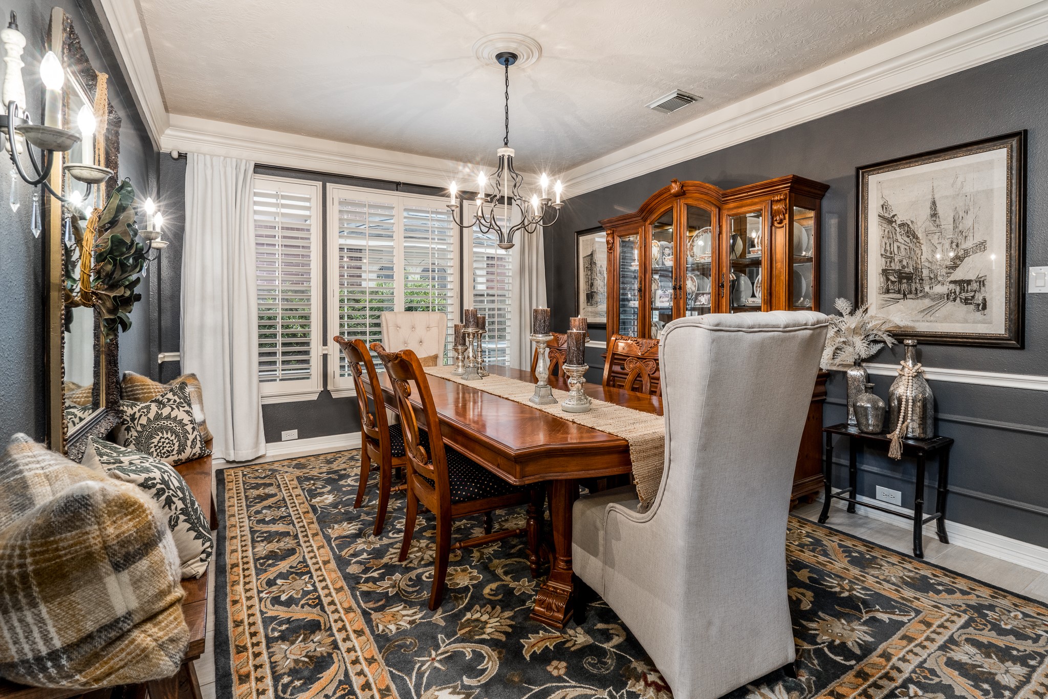 10411 Harnwell Crossing Drive Spring, TX 77379 - Photo 7 of 50 a dining room with furniture a chandelier and wooden floor