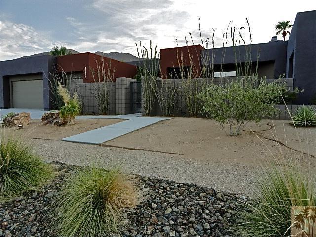 71299 Biskra Road Rancho Mirage, CA 92270 - Photo 2 of 10 a backyard of a house with lots of green space