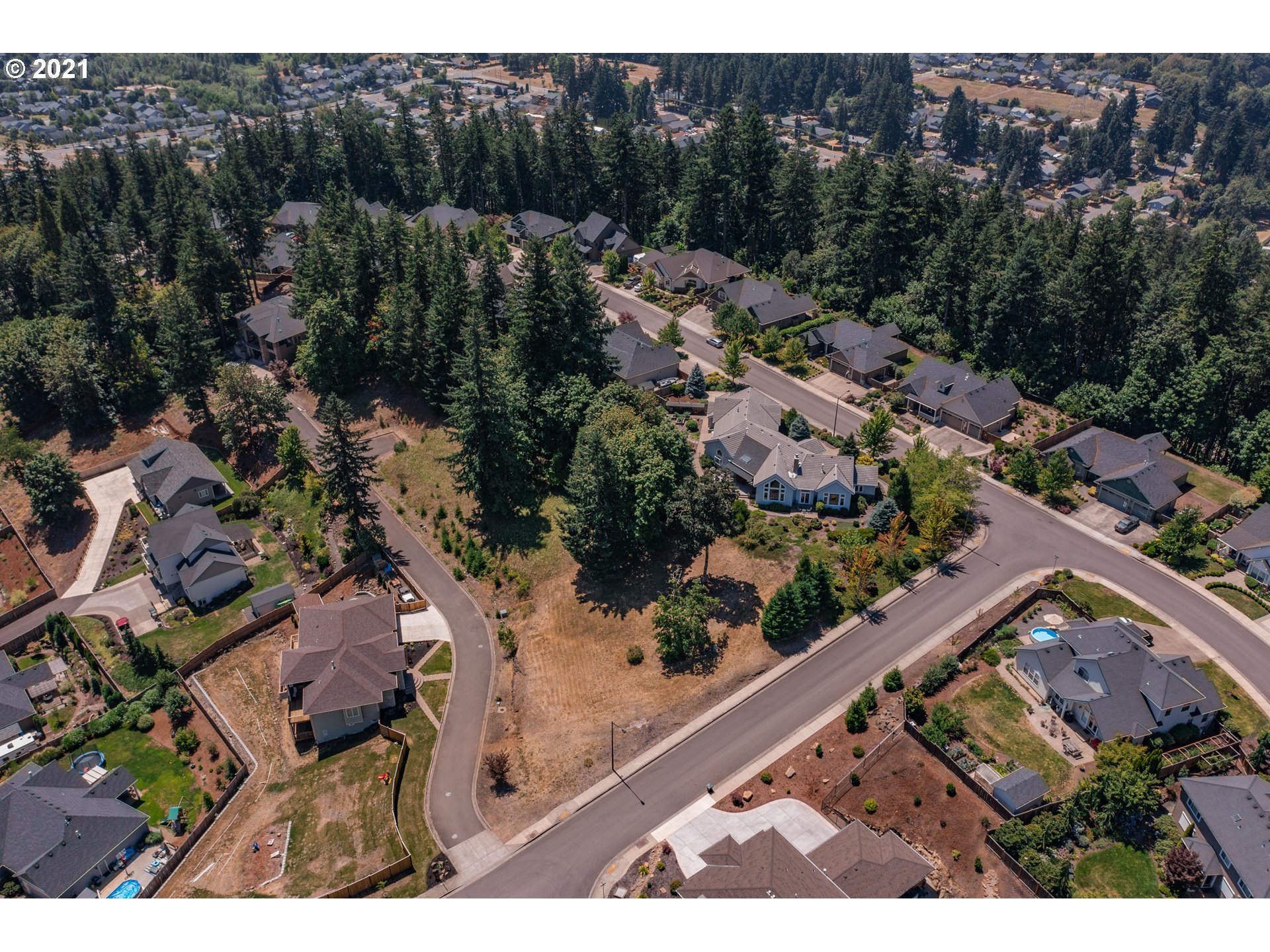 6275 Graystone Loop Springfield, OR 97478 - Photo 5 of 6 an aerial view of residential houses with outdoor space