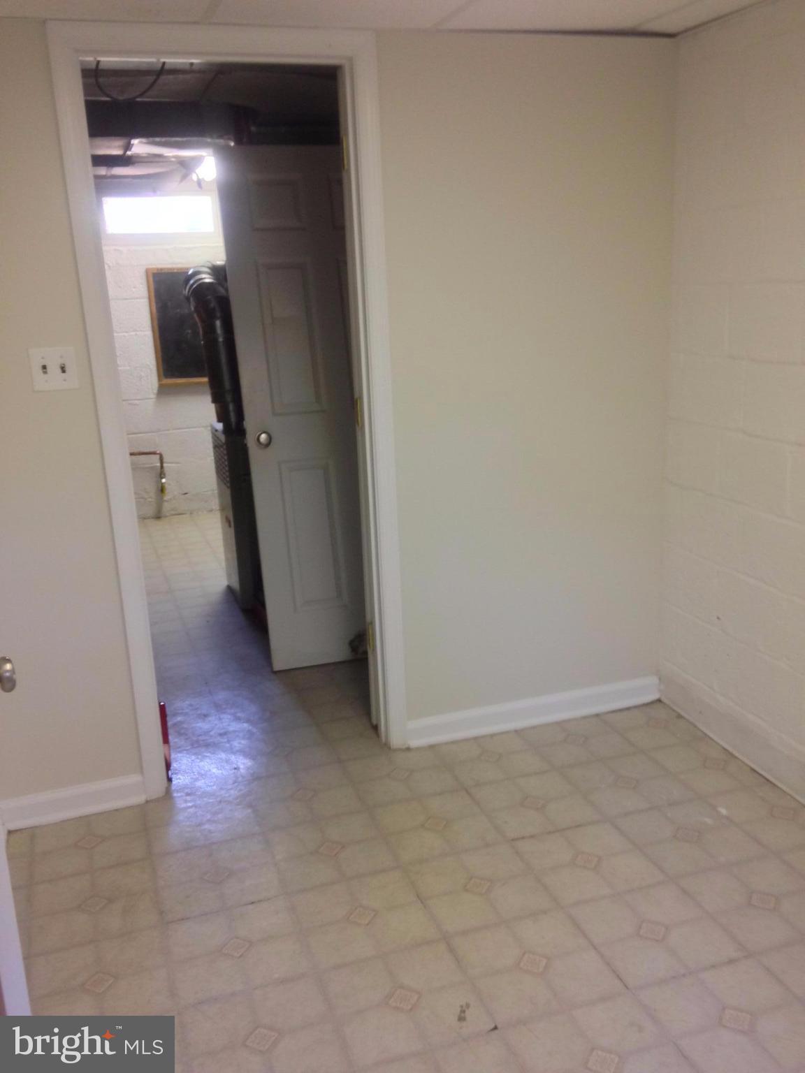 505 Stirling Road Silver Spring, MD 20901 - Photo 20 of 26 Utility room allows for lots of storage!