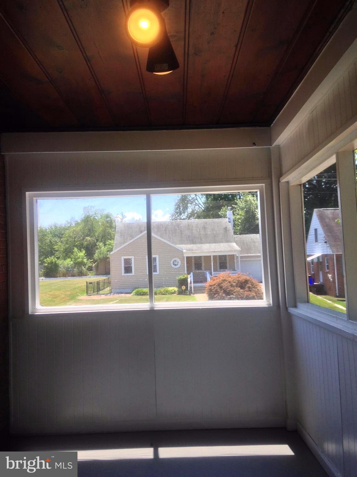 505 Stirling Road Silver Spring, MD 20901 - Photo 5 of 26 Screened porch - enjoy the outside without bugs!