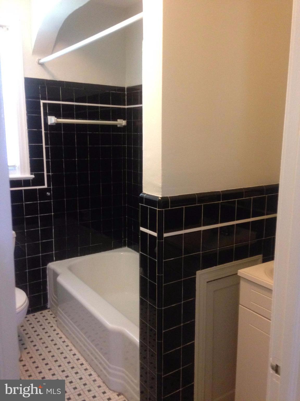 505 Stirling Road Silver Spring, MD 20901 - Photo 10 of 26 Bathroom has great tile from the period!