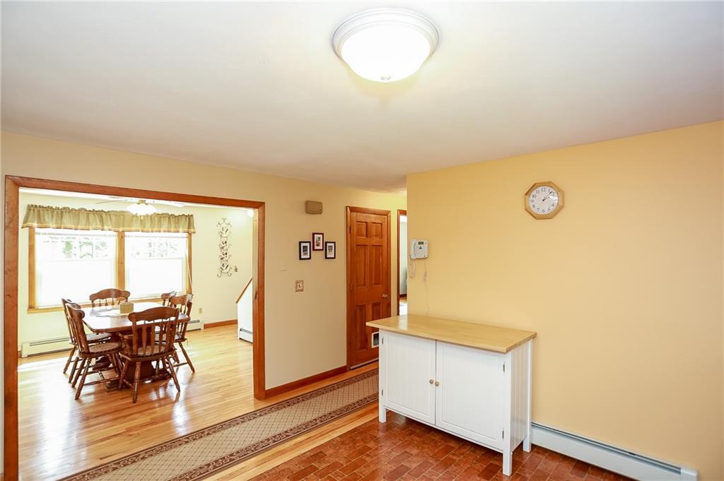 81 Dow Road Standish, ME 04084 - Photo 10 of 32 The kitchen opens up into the dining...