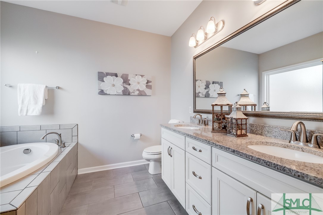110 Baynard Street Pooler, GA 31322 - Photo 21 of 44 En suite bath with soaking tub, shower, dual vanit