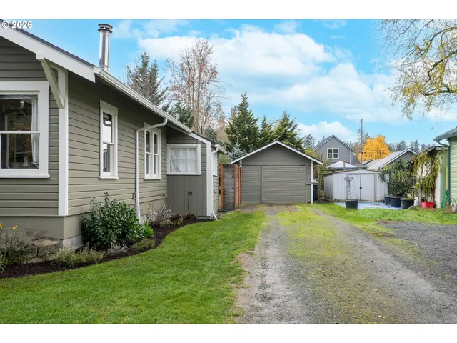 a house view with a garden space