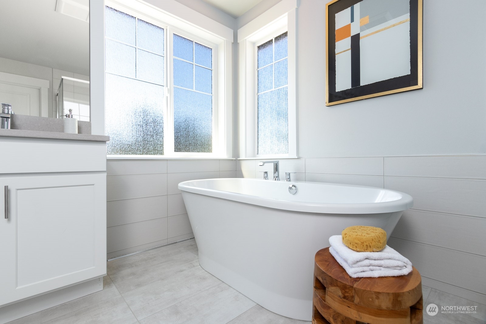 859 Field Avenue Northeast Renton, WA 98059 - Photo 20 of 27 a bathroom with a sink and a window
