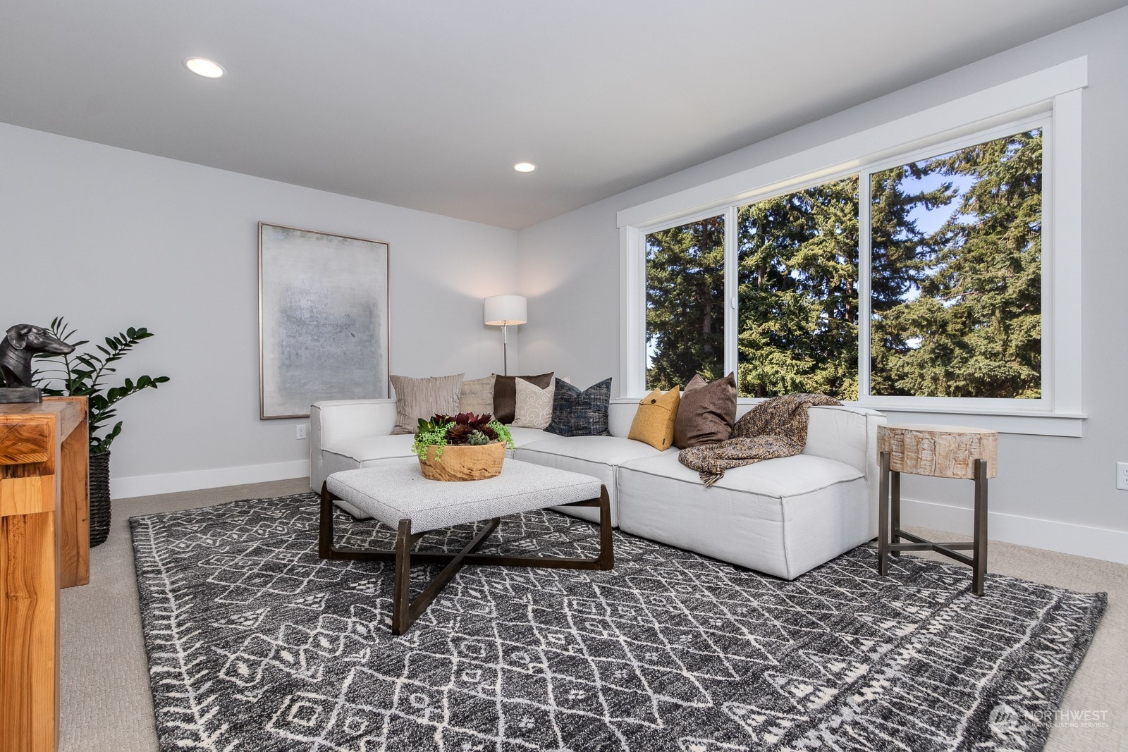 859 Field Avenue Northeast Renton, WA 98059 - Photo 23 of 27 a living room with furniture and a potted plant