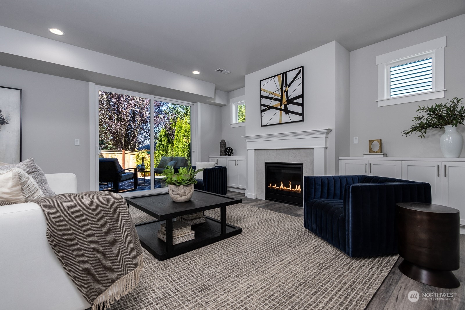 859 Field Avenue Northeast Renton, WA 98059 - Photo 4 of 27 a living room with furniture and a fireplace
