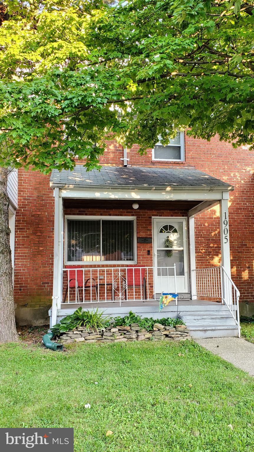 1905 Stanhope Road Baltimore, MD 21222 - Photo 1 of 16 front view of a house with a yard