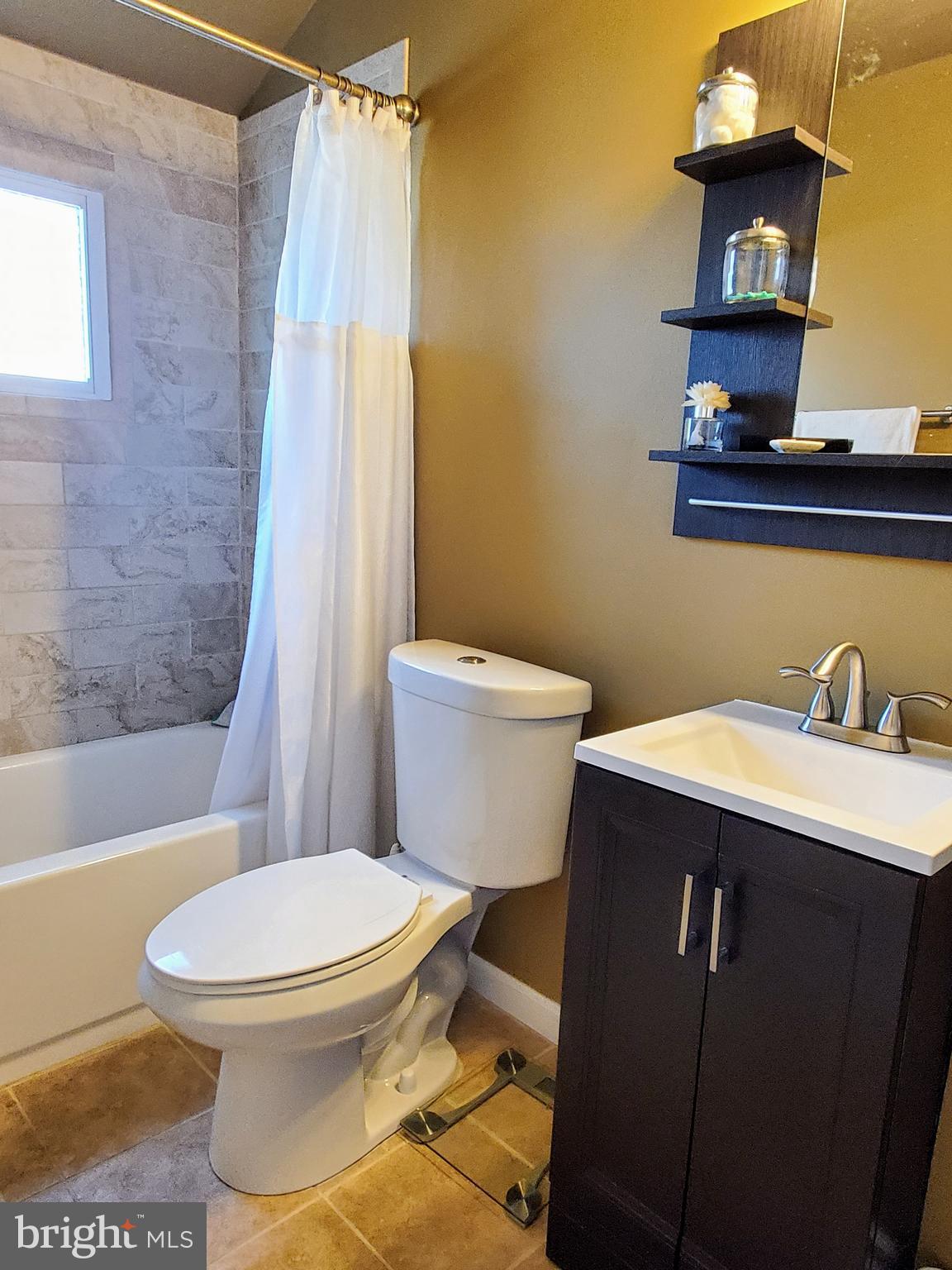 1905 Stanhope Road Baltimore, MD 21222 - Photo 11 of 16 a bathroom with a toilet and a sink