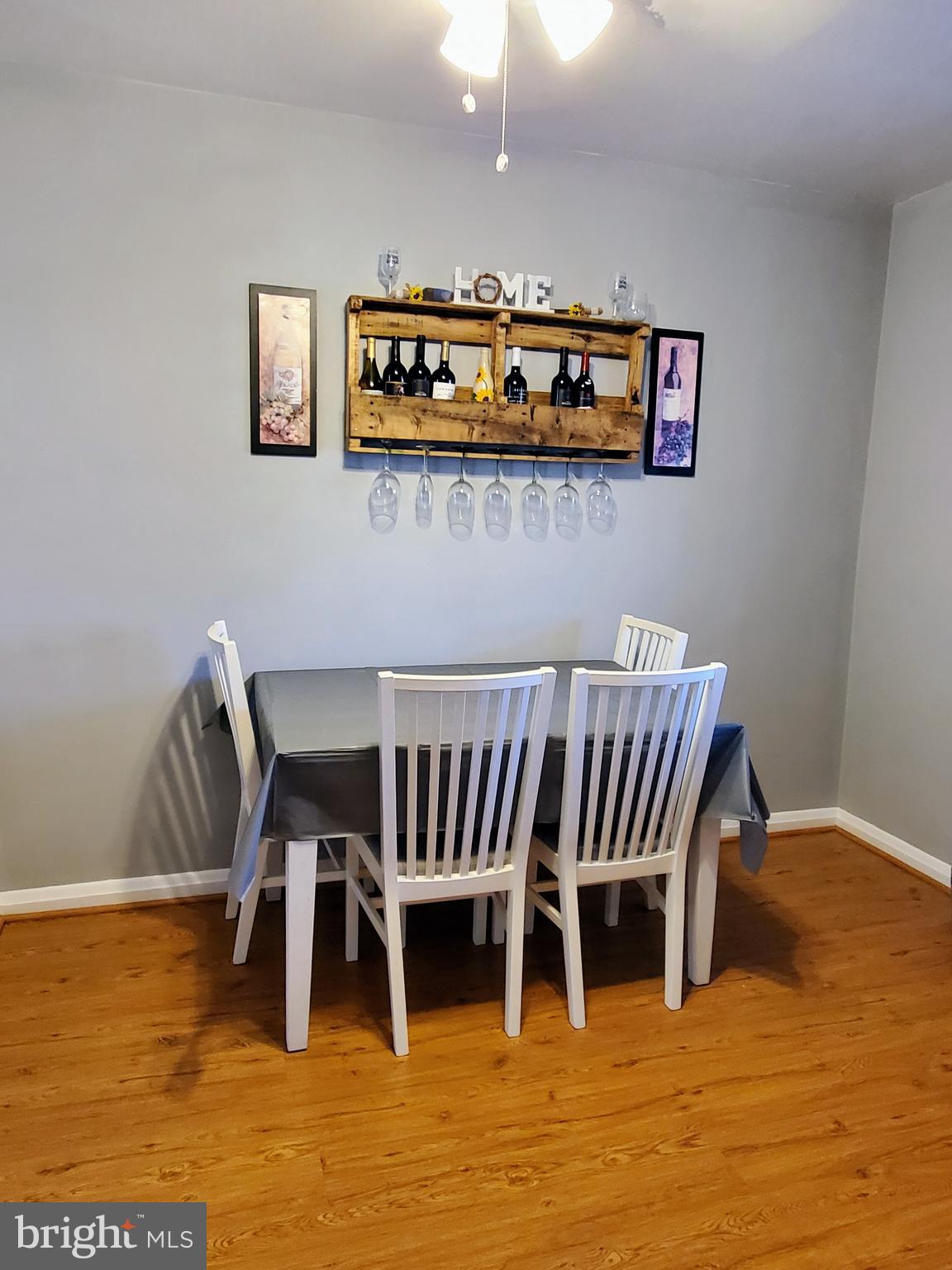 1905 Stanhope Road Baltimore, MD 21222 - Photo 4 of 16 a view of a dining room with furniture wooden floor and chandelier