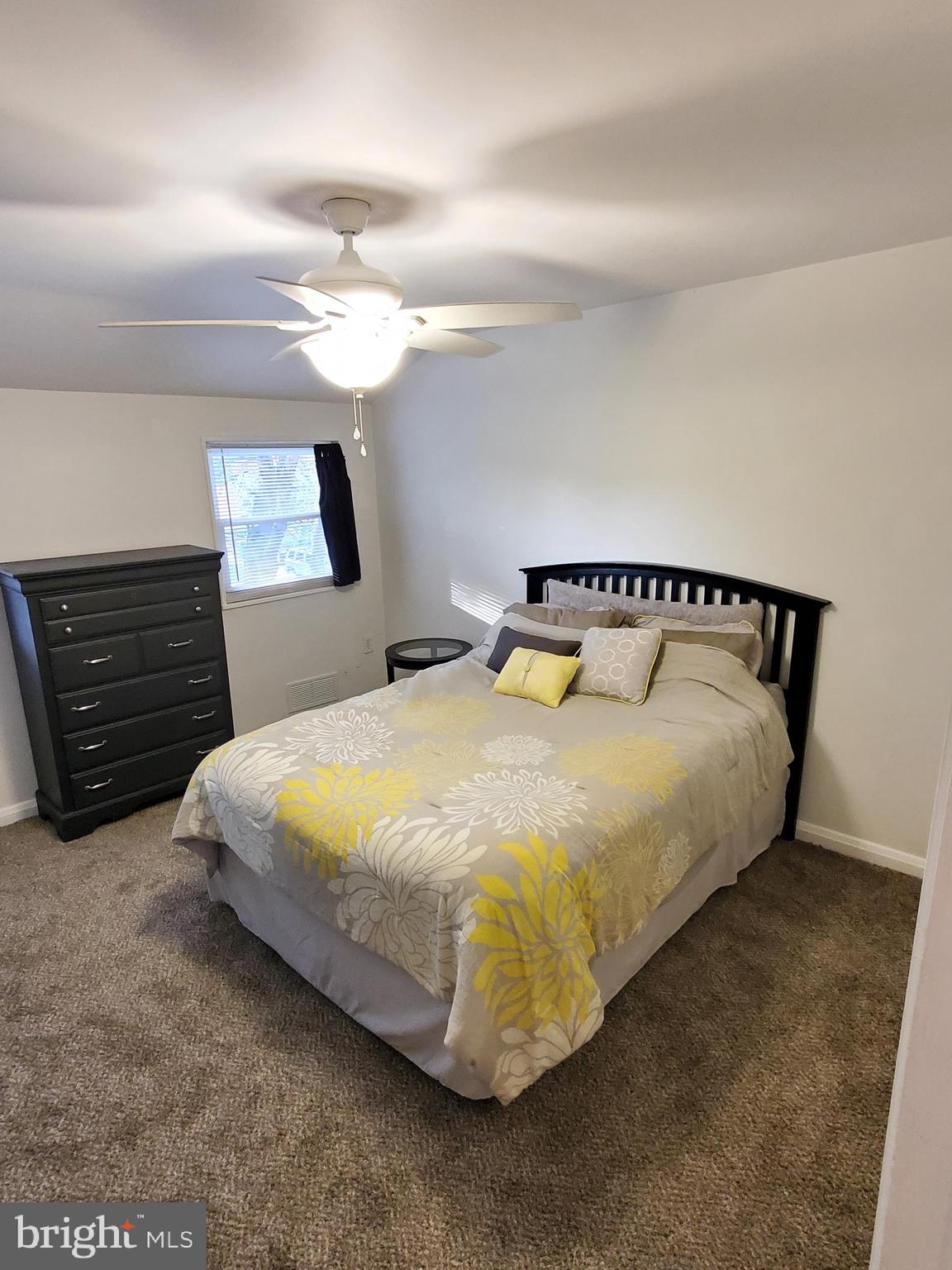 1905 Stanhope Road Baltimore, MD 21222 - Photo 8 of 16 a bedroom with a bed and a tv