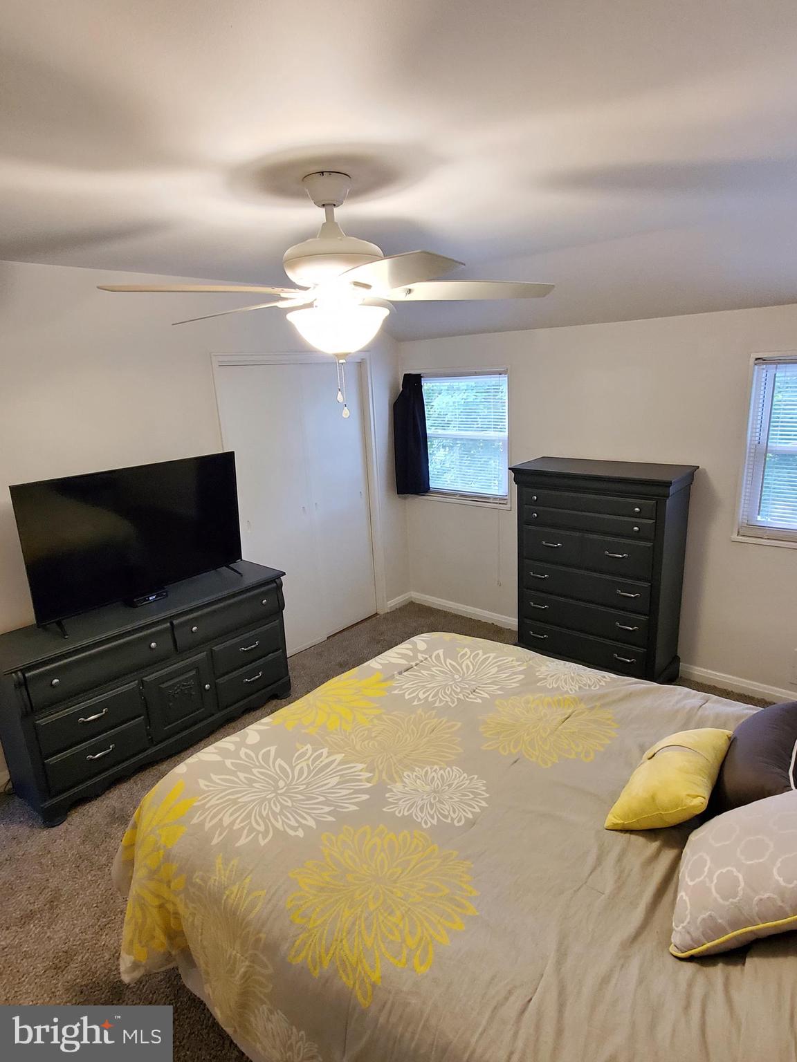 1905 Stanhope Road Baltimore, MD 21222 - Photo 9 of 16 a bedroom with a bed and flat screen tv