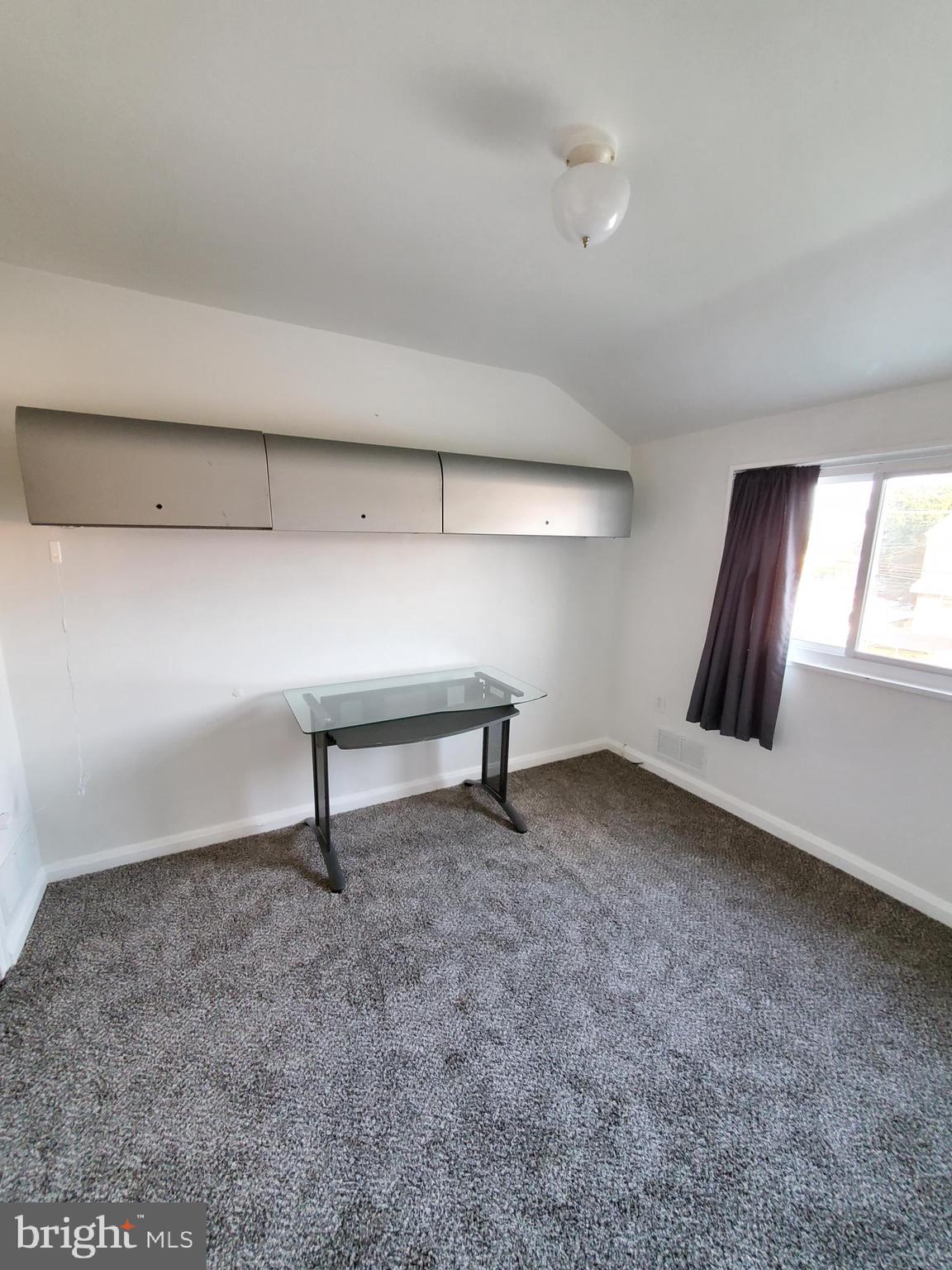 1905 Stanhope Road Baltimore, MD 21222 - Photo 10 of 16 a view of an empty room and window