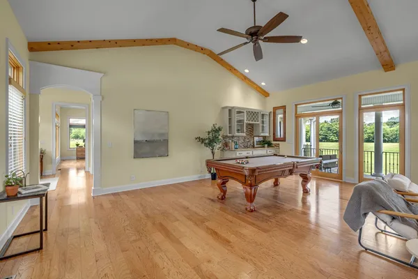 a kitchen with stainless steel appliances granite countertop a sink and cabinets