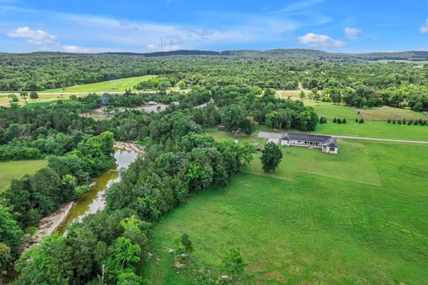 a view of a city with mountains in the background