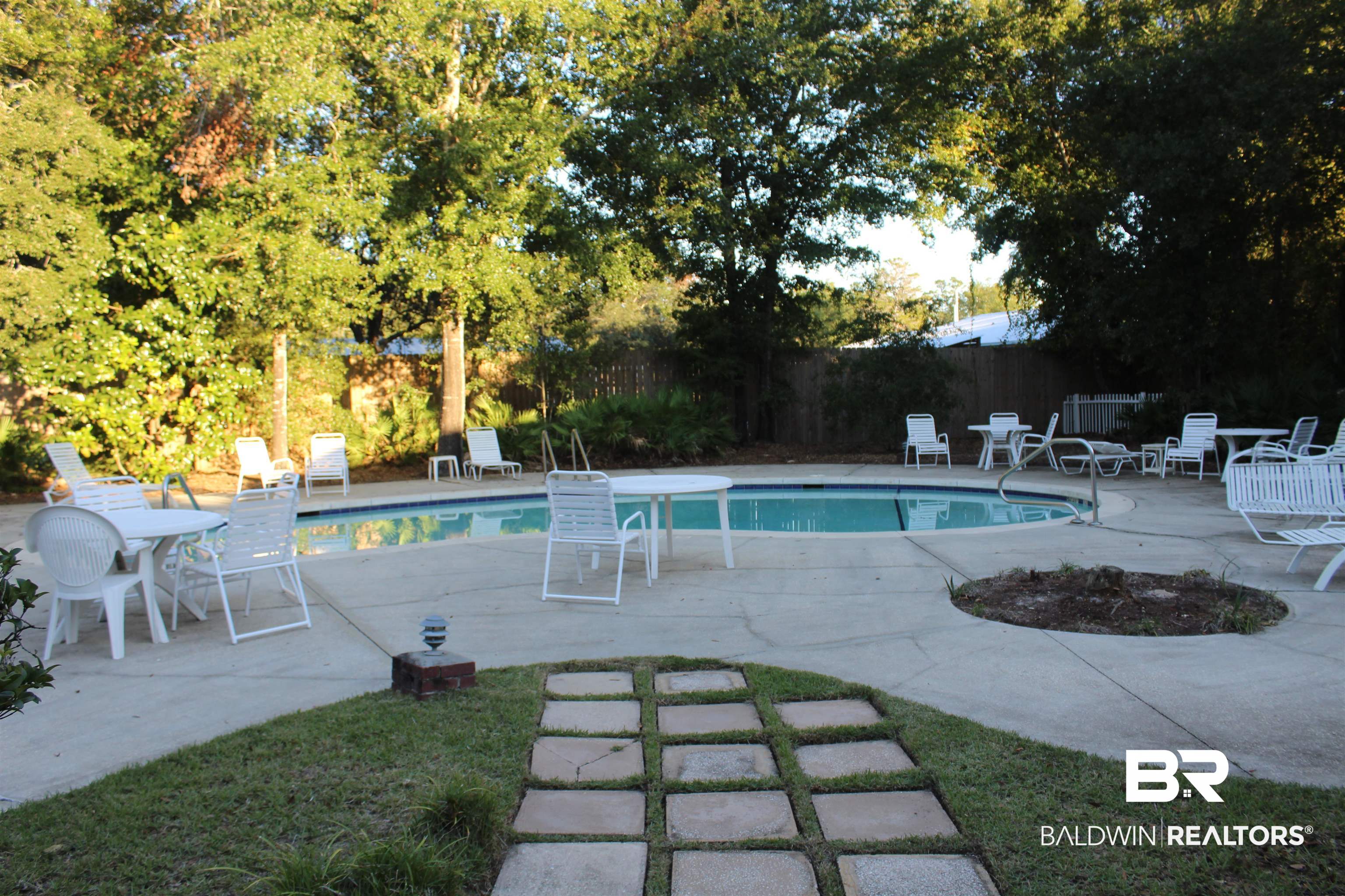 430 West Fort Morgan Road, Unit 1101 Gulf Shores, AL 36542 - Photo 13 of 16 View of pool featuring a patio