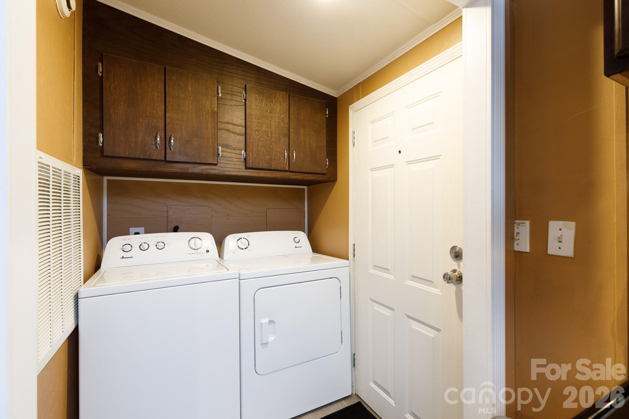 652 Sutton Spring Road York, SC 29745 - Photo 16 of 28 a utility room with dryer and washer