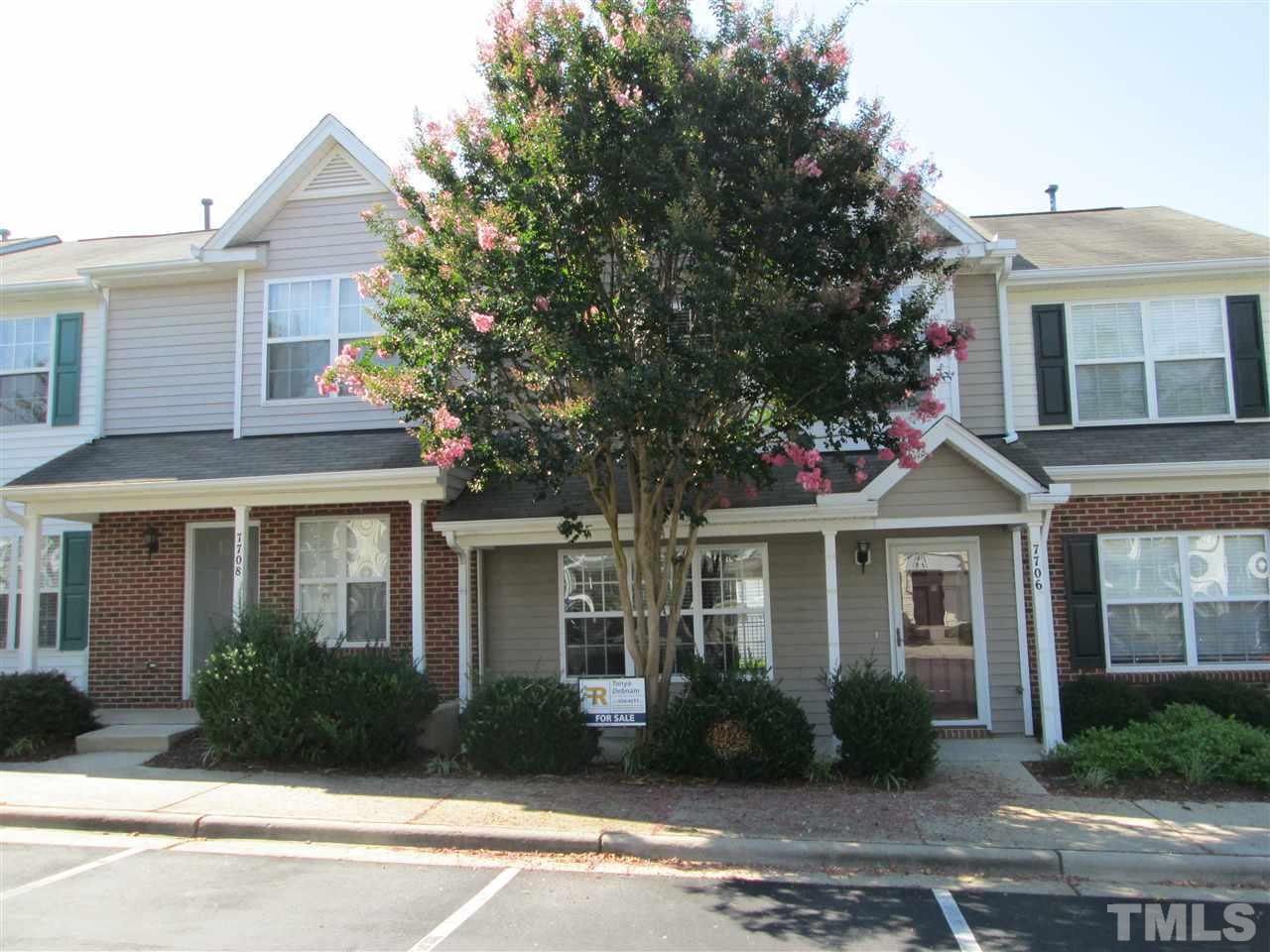 7706 River Field Drive Raleigh, NC 27616 - Photo 1 of 20 front view of a house next to a yard