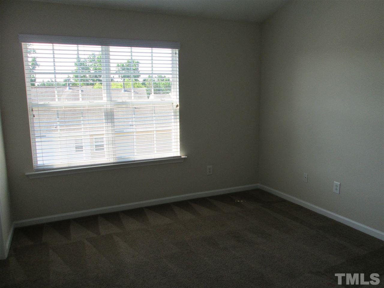 7706 River Field Drive Raleigh, NC 27616 - Photo 12 of 20 a view of an empty room with a window