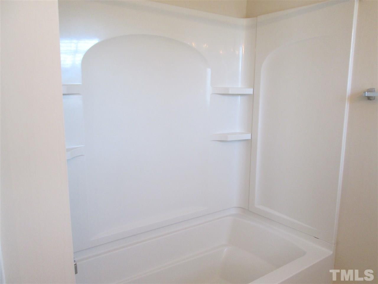 7706 River Field Drive Raleigh, NC 27616 - Photo 14 of 20 a close up of a white marble wall