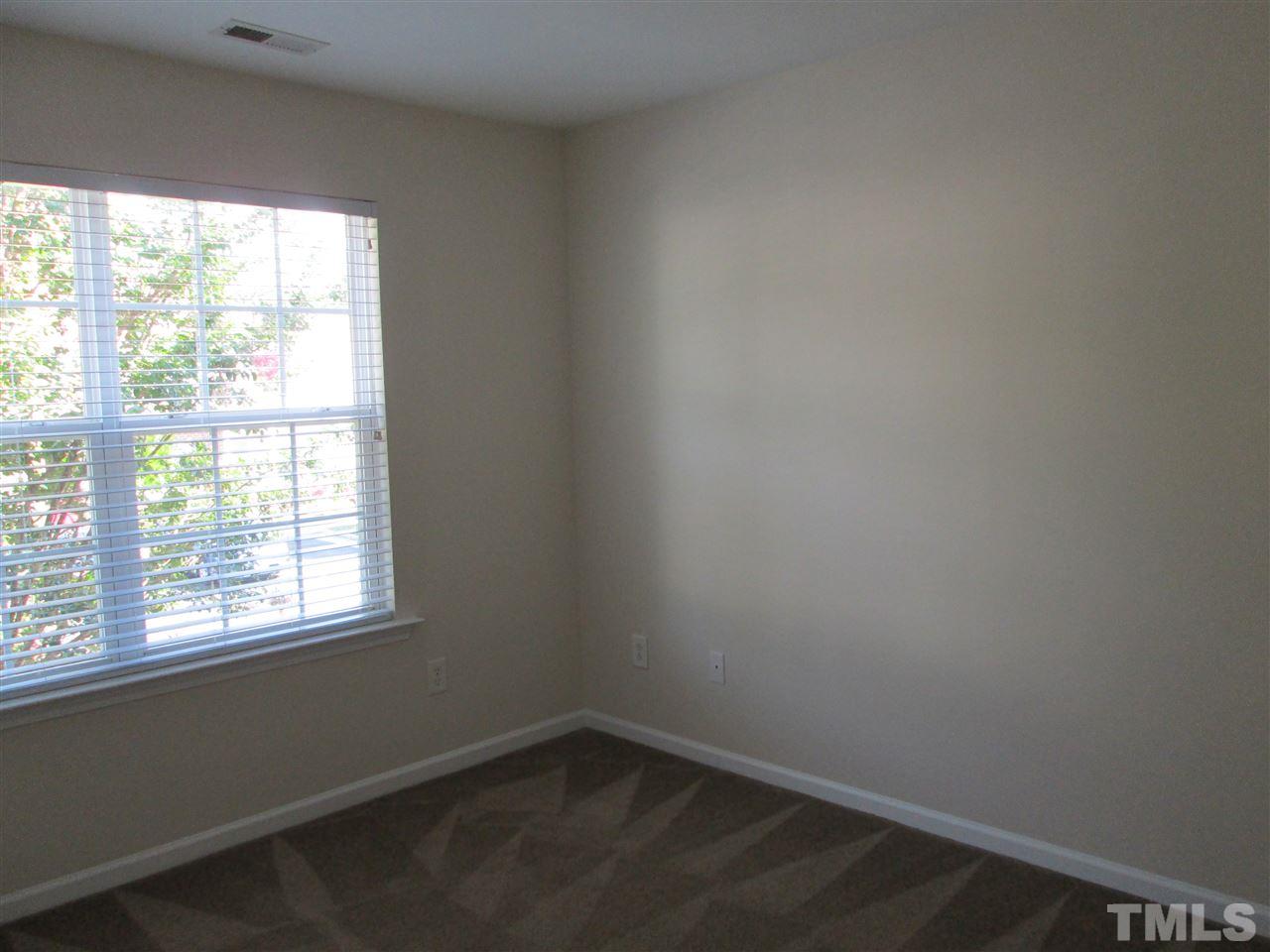 7706 River Field Drive Raleigh, NC 27616 - Photo 19 of 20 an empty room with a window